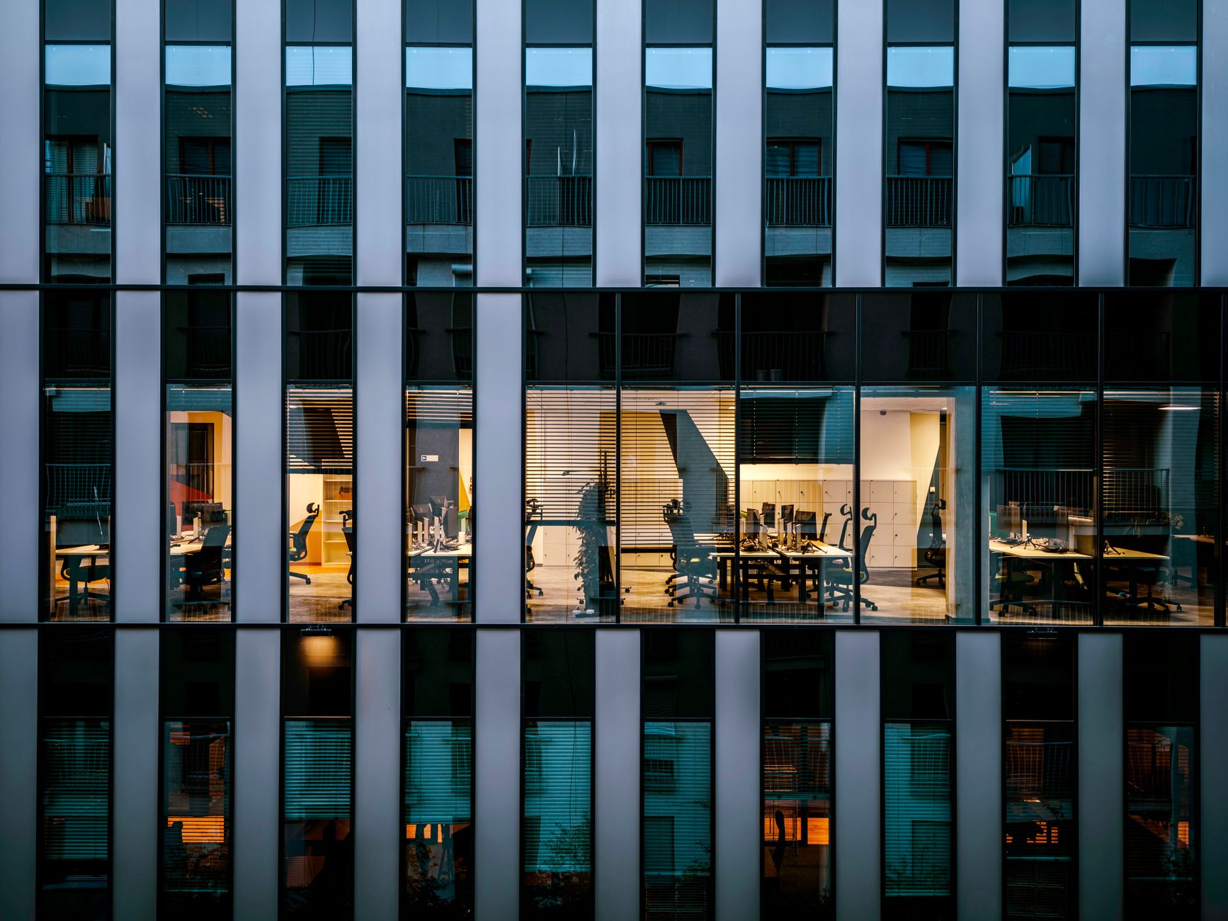 City office building with lit windows